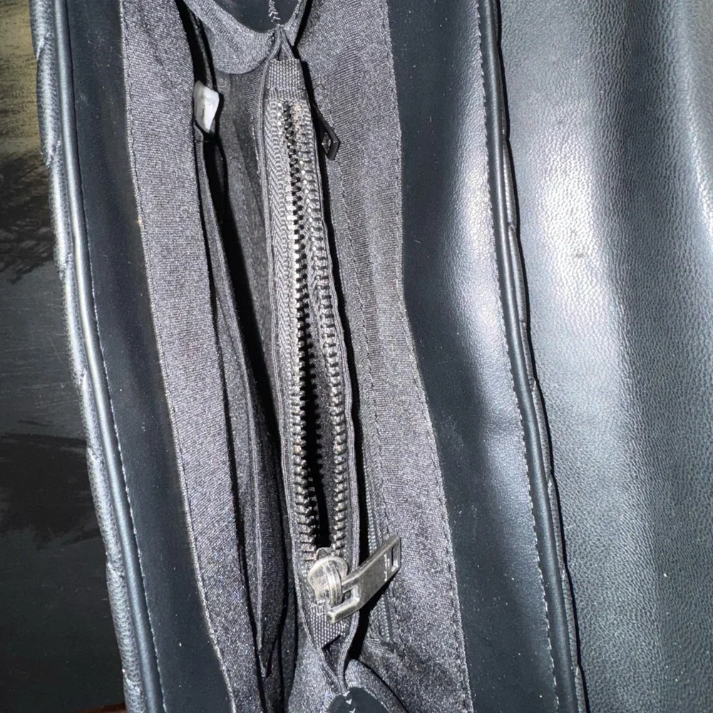 Yves Saint Laurent Black Quilted Leather Top-Handle Satchel with Gold Logo